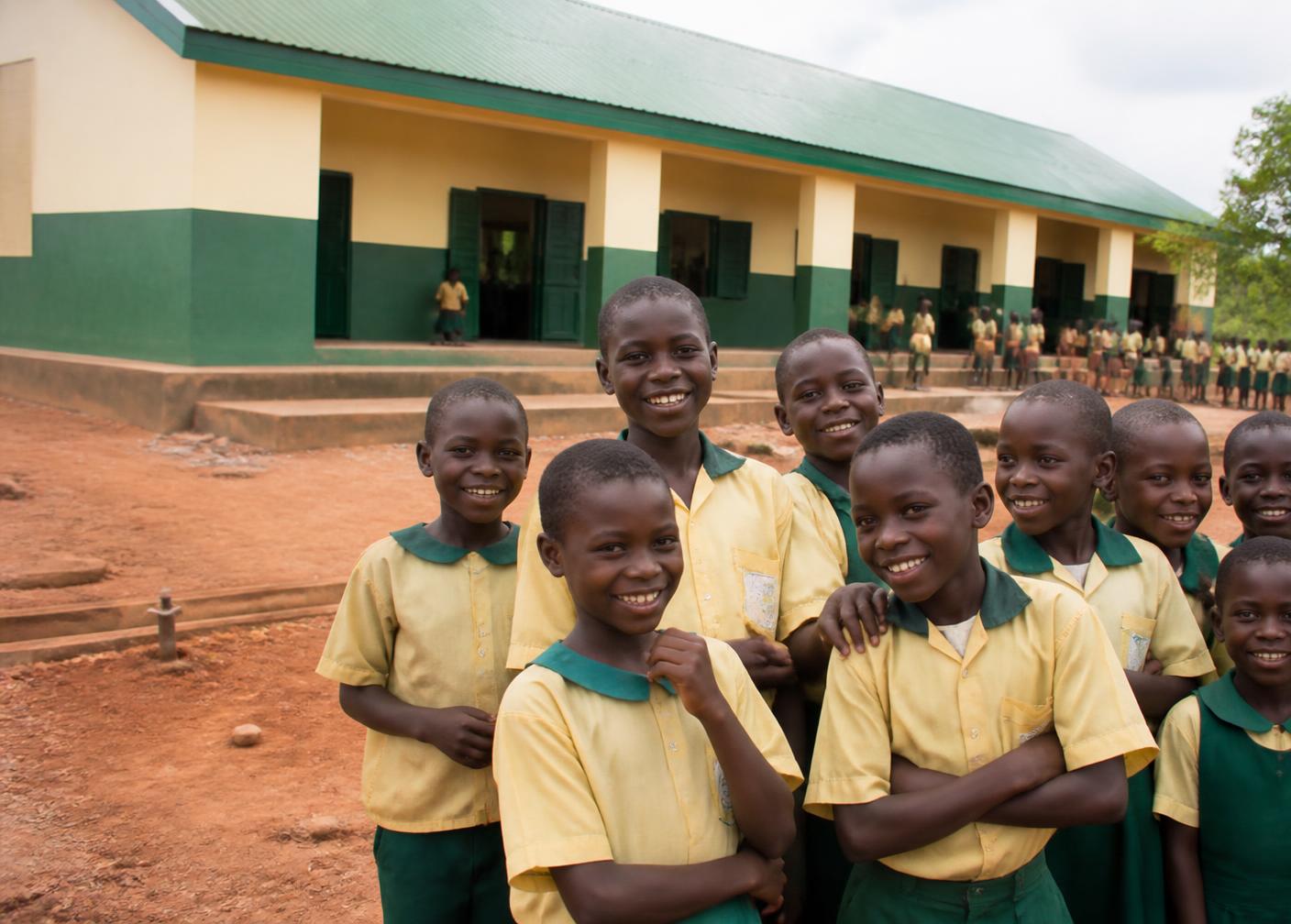 Pupils outside a newly built rural classroom block